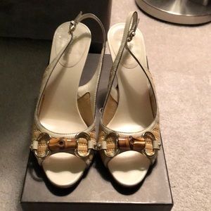 Authentic Gucci raffia slingback with bamboo bit.